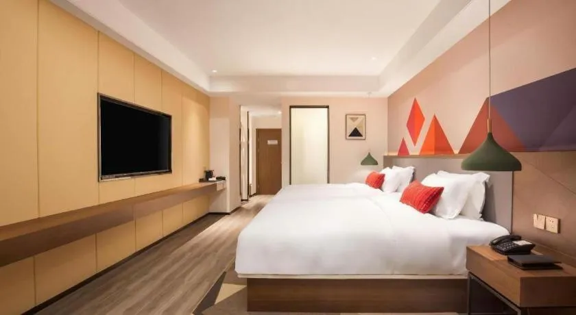 Bed in Borrman Hotel Guilin North Railway Station Zhonghao International