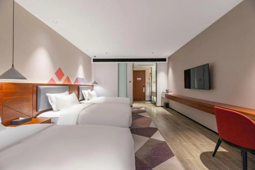 Bed in Borrman Hotel Guilin North Railway Station Zhonghao International