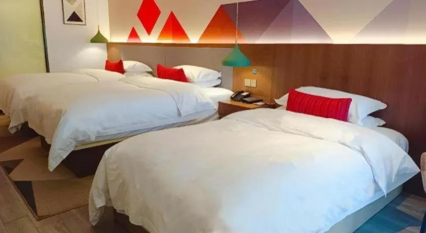 Bed in Borrman Hotel Guilin North Railway Station Zhonghao International