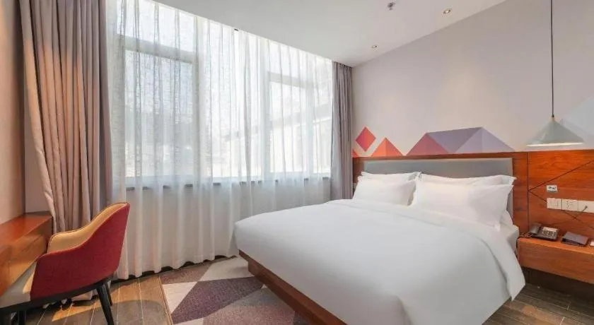 Bed in Borrman Hotel Guilin North Railway Station Zhonghao International