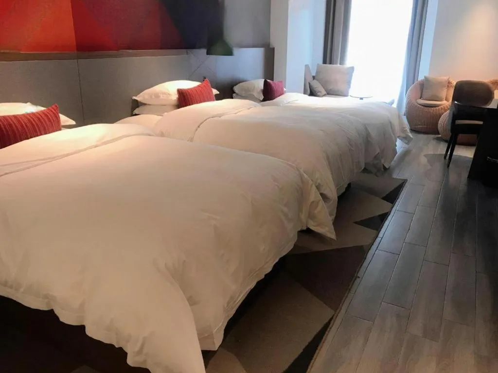 Bed in Borrman Hotel Guilin North Railway Station Zhonghao International