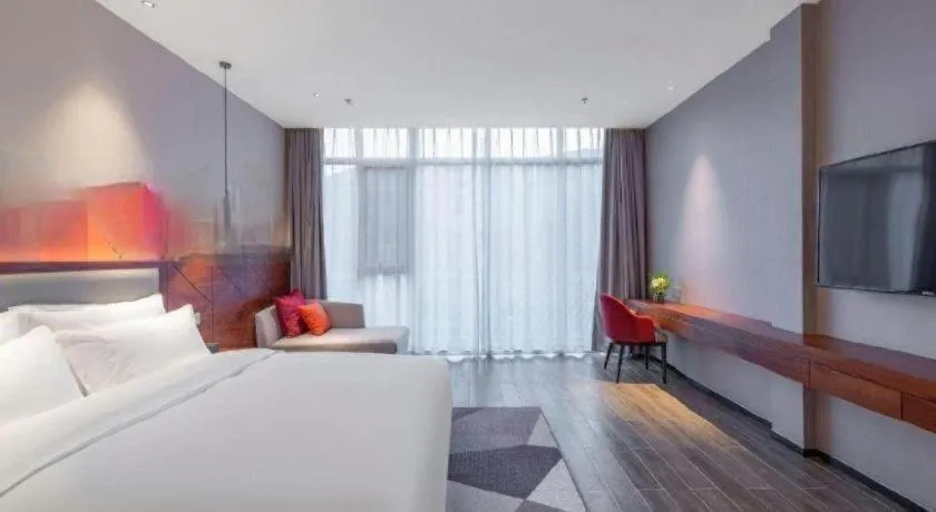 Bed in Borrman Hotel Guilin North Railway Station Zhonghao International