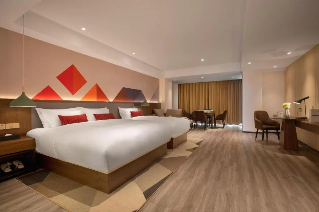 Bed in Borrman Hotel Guilin North Railway Station Zhonghao International