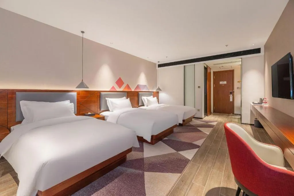 Bed in Borrman Hotel Guilin North Railway Station Zhonghao International