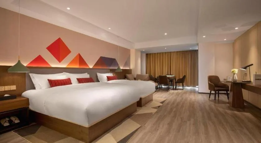 Bed in Borrman Hotel Guilin North Railway Station Zhonghao International