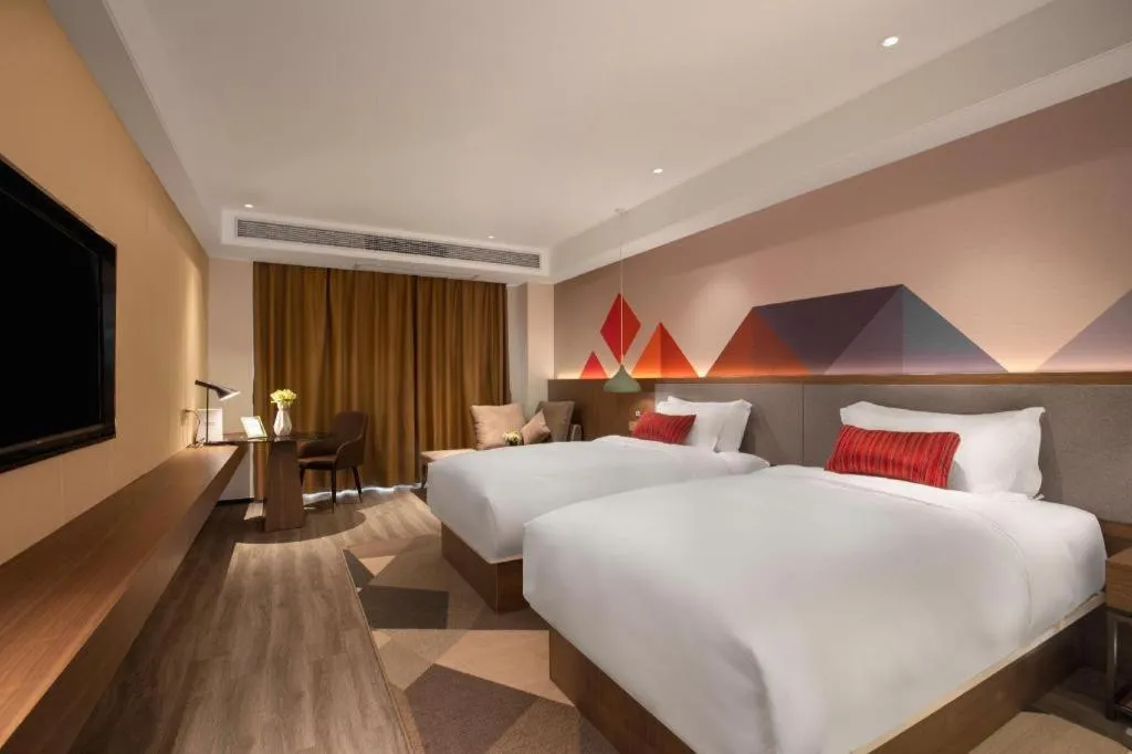 Bed in Borrman Hotel Guilin North Railway Station Zhonghao International