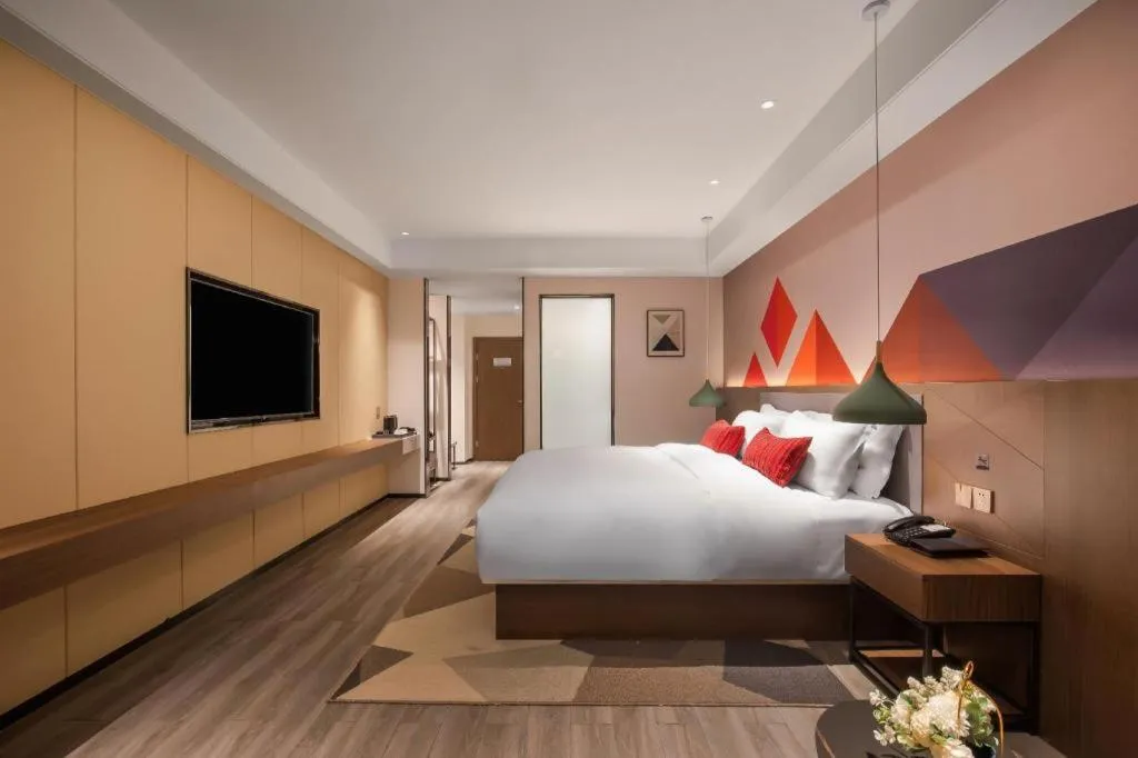 Bed in Borrman Hotel Guilin North Railway Station Zhonghao International