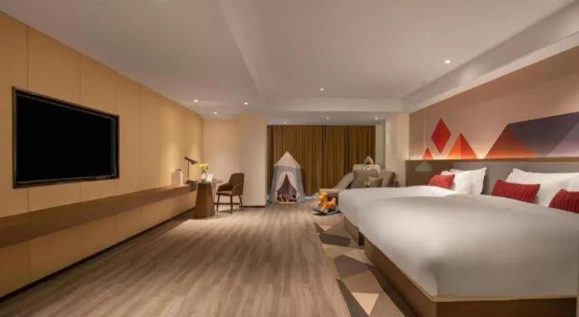 Bed in Borrman Hotel Guilin North Railway Station Zhonghao International