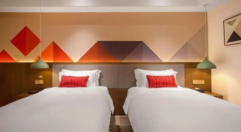 Bed in Borrman Hotel Guilin North Railway Station Zhonghao International