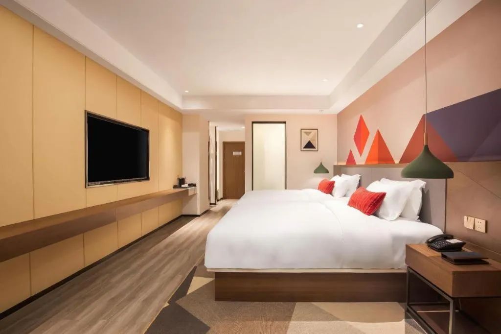 Bed in Borrman Hotel Guilin North Railway Station Zhonghao International