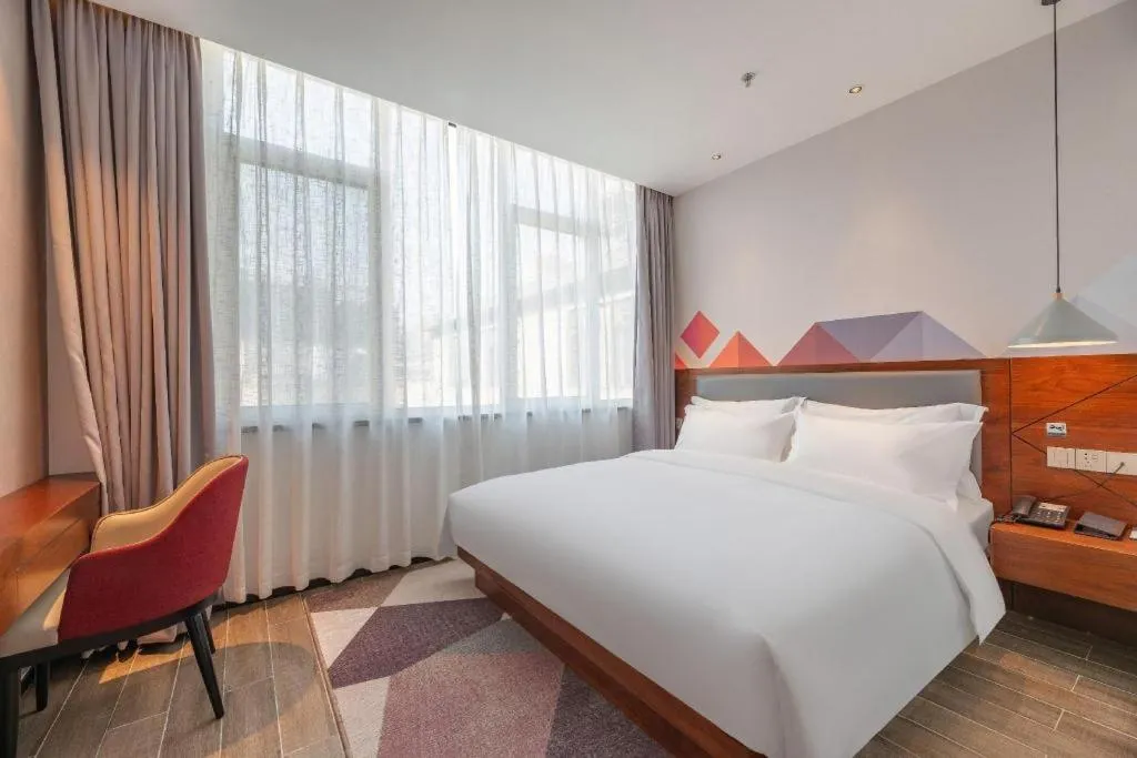 Bed in Borrman Hotel Guilin North Railway Station Zhonghao International