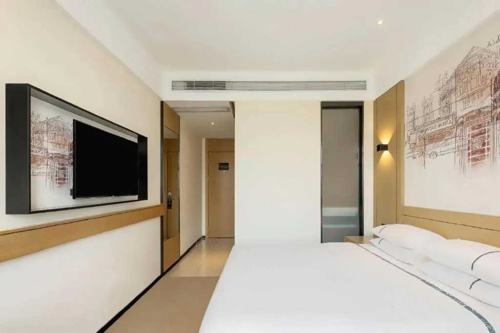 Bed in City Comfort Inn Handan New Century Plaza