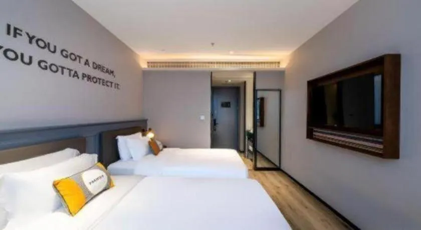 Bed in Premier City Comfort Hotel Suizhou Wuyue Plaza