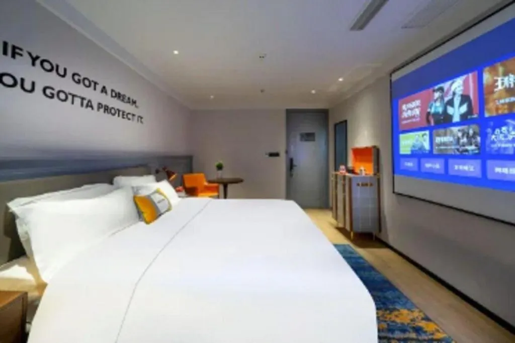 Bed in Premier City Comfort Hotel Suizhou Wuyue Plaza