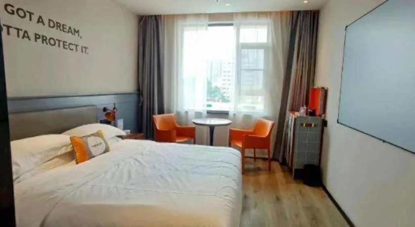 Bed in Premier City Comfort Hotel Suizhou Wuyue Plaza