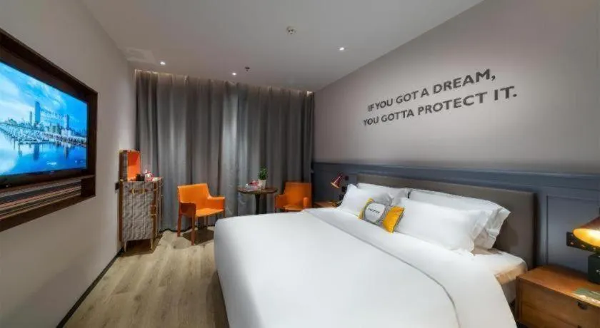 Bed in Premier City Comfort Hotel Suizhou Wuyue Plaza