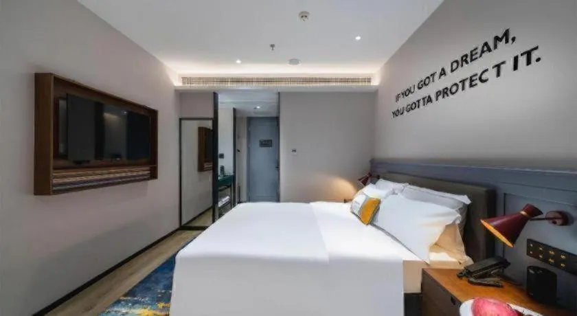 Bed in Premier City Comfort Hotel Suizhou Wuyue Plaza