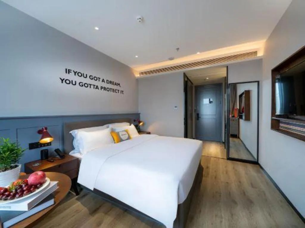 Bed in Premier City Comfort Hotel Suizhou Wuyue Plaza