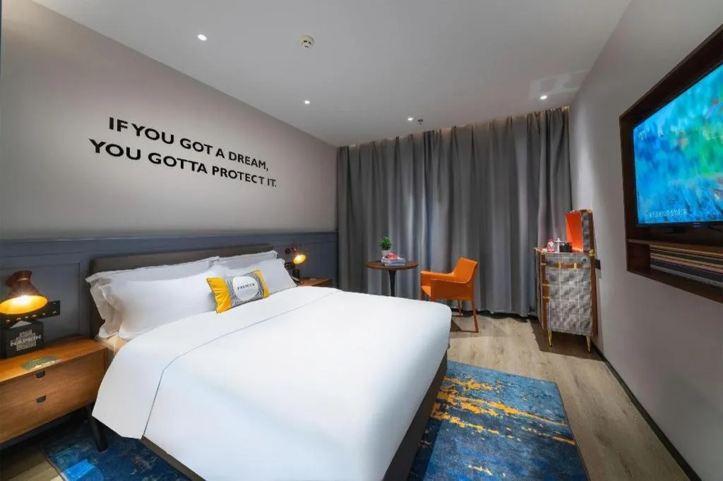 Bed in Premier City Comfort Hotel Suizhou Wuyue Plaza