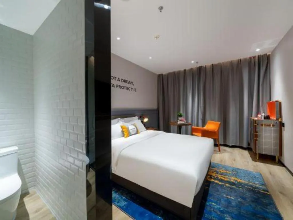 Bed in Premier City Comfort Hotel Suizhou Wuyue Plaza