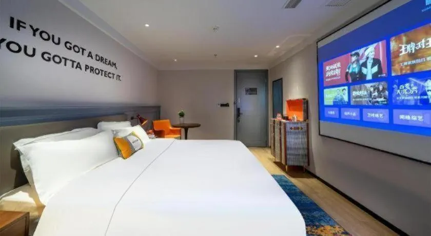 Bed in Premier City Comfort Hotel Suizhou Wuyue Plaza