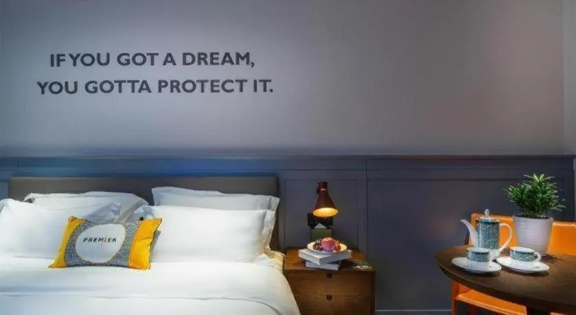 Bed in Premier City Comfort Hotel Suizhou Wuyue Plaza