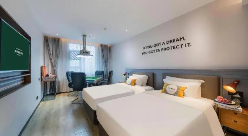 Bed in Premier City Comfort Hotel Suizhou Wuyue Plaza