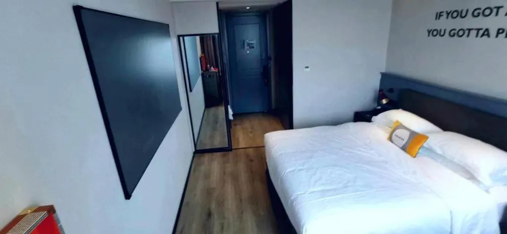 Bed in Premier City Comfort Hotel Suizhou Wuyue Plaza