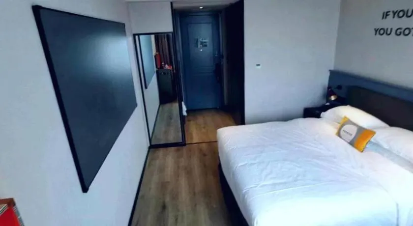 Bed in Premier City Comfort Hotel Suizhou Wuyue Plaza