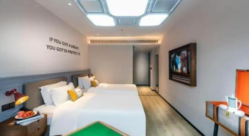 Bed in Premier City Comfort Hotel Suizhou Wuyue Plaza