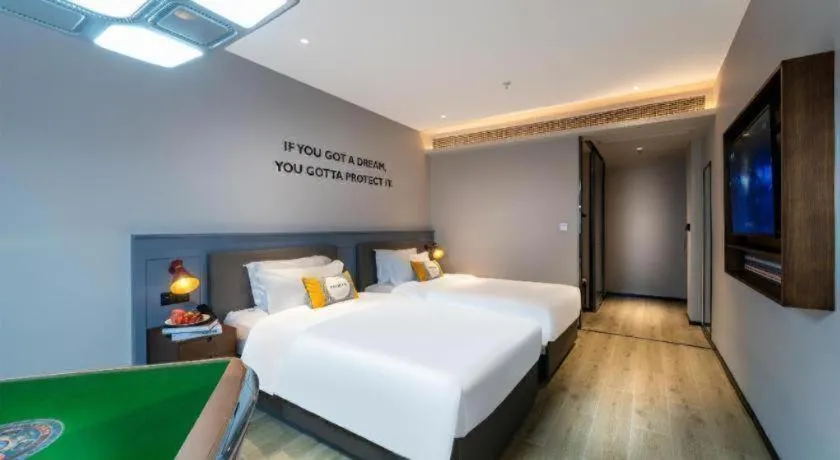 Bed in Premier City Comfort Hotel Suizhou Wuyue Plaza