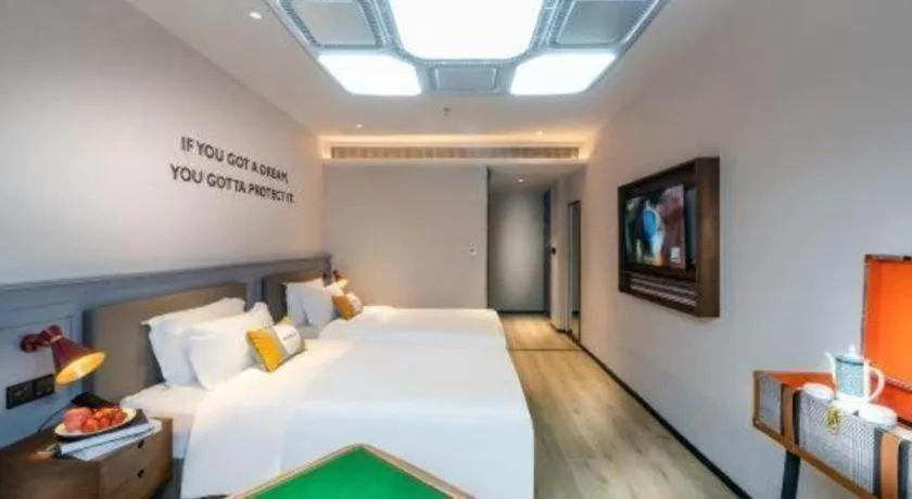 Bed in Premier City Comfort Hotel Suizhou Wuyue Plaza