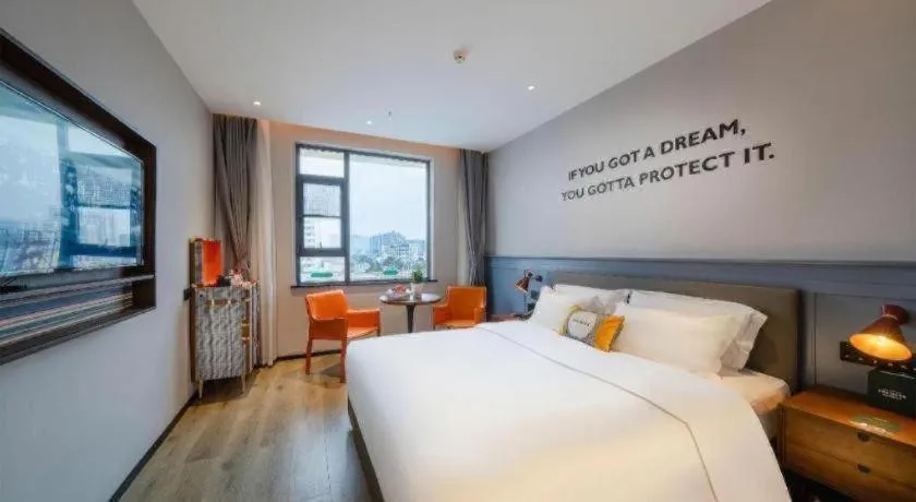 Bed in Premier City Comfort Hotel Suizhou Wuyue Plaza