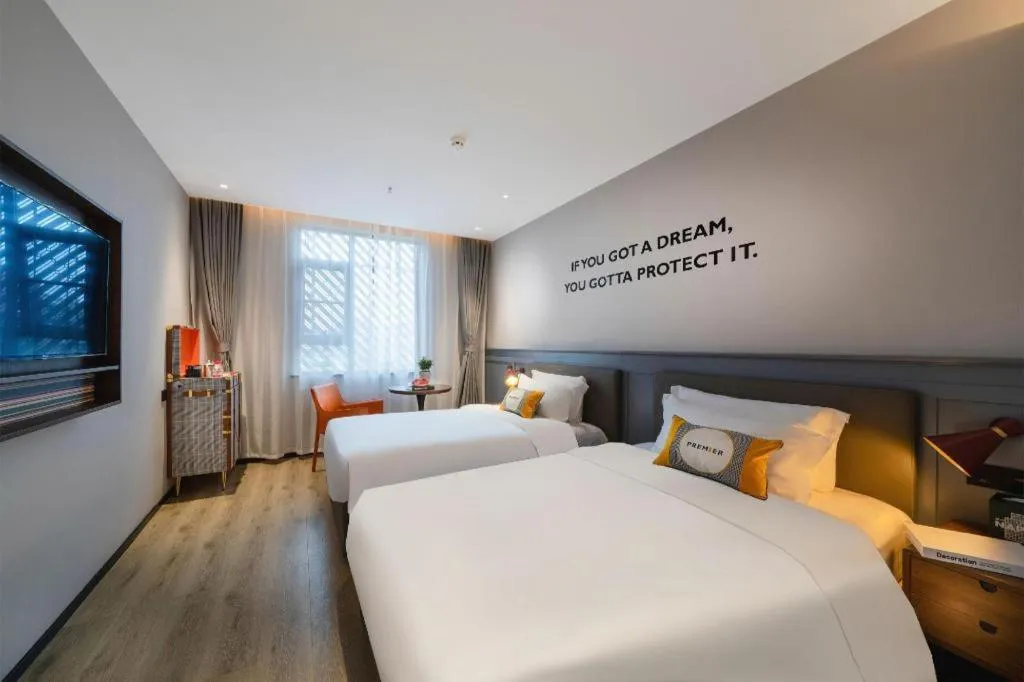 Bed in Premier City Comfort Hotel Suizhou Wuyue Plaza