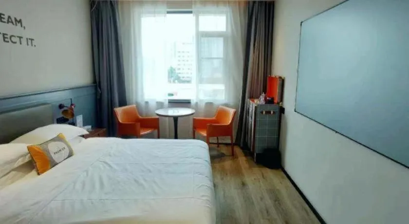 Bed in Premier City Comfort Hotel Suizhou Wuyue Plaza