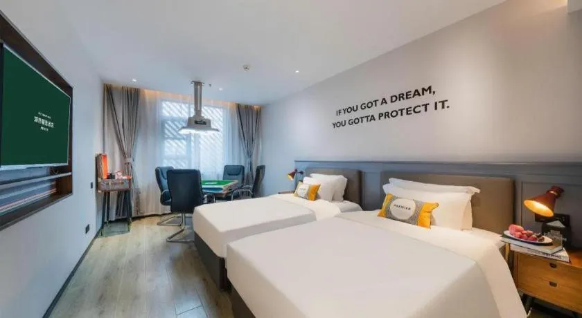 Bed in Premier City Comfort Hotel Suizhou Wuyue Plaza