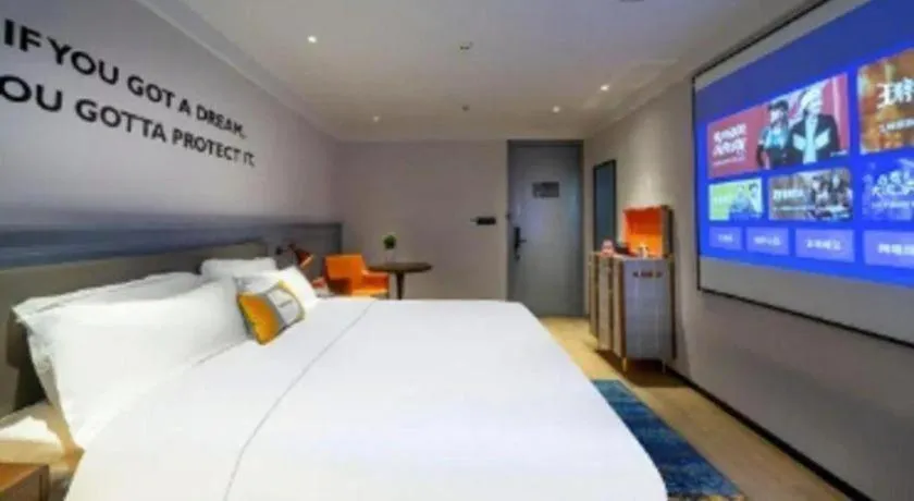 Bed in Premier City Comfort Hotel Suizhou Wuyue Plaza