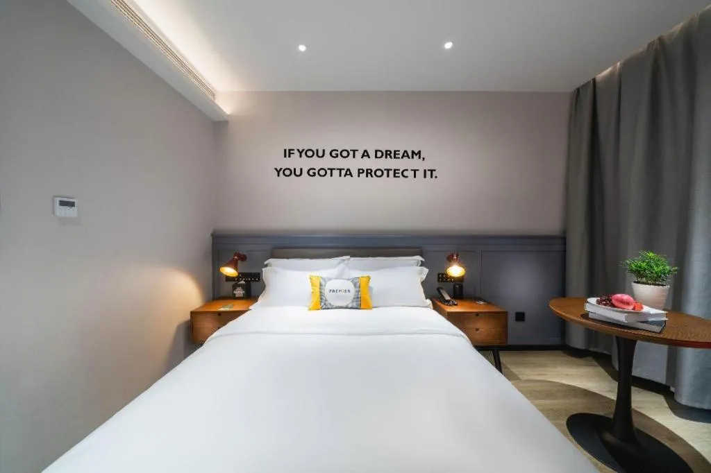 Bed in Premier City Comfort Hotel Suizhou Wuyue Plaza