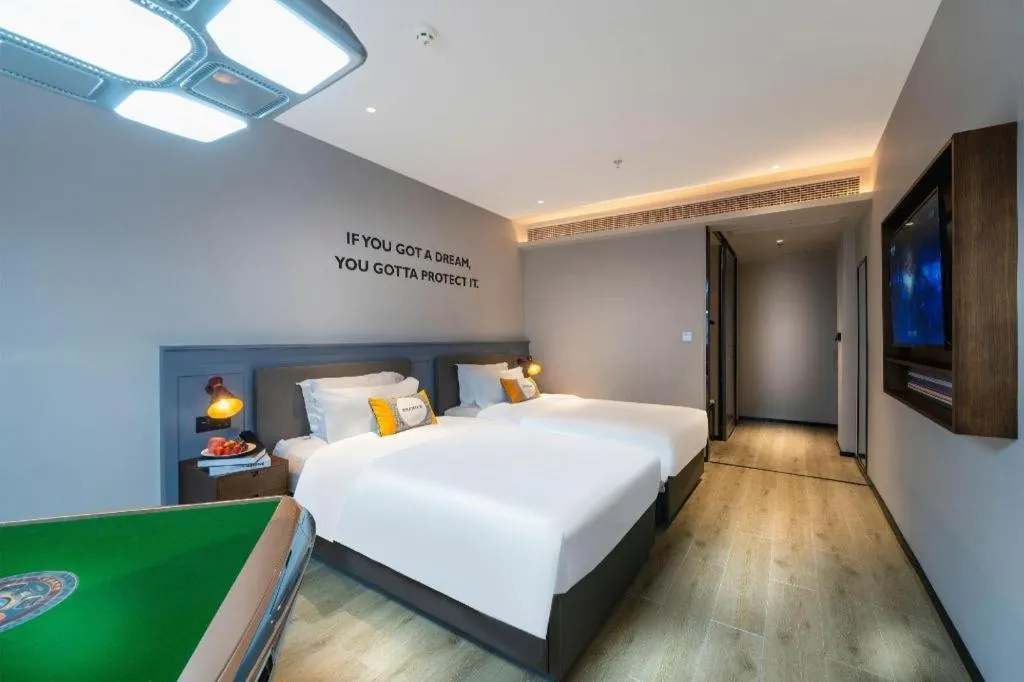 Bed in Premier City Comfort Hotel Suizhou Wuyue Plaza
