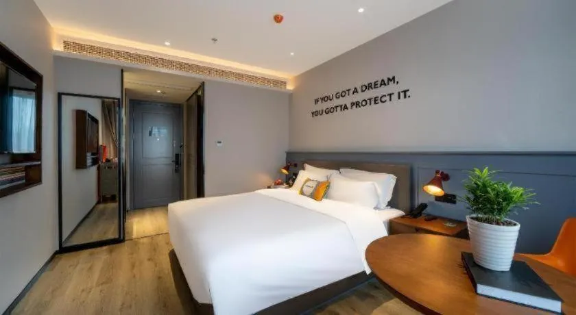 Bed in Premier City Comfort Hotel Suizhou Wuyue Plaza