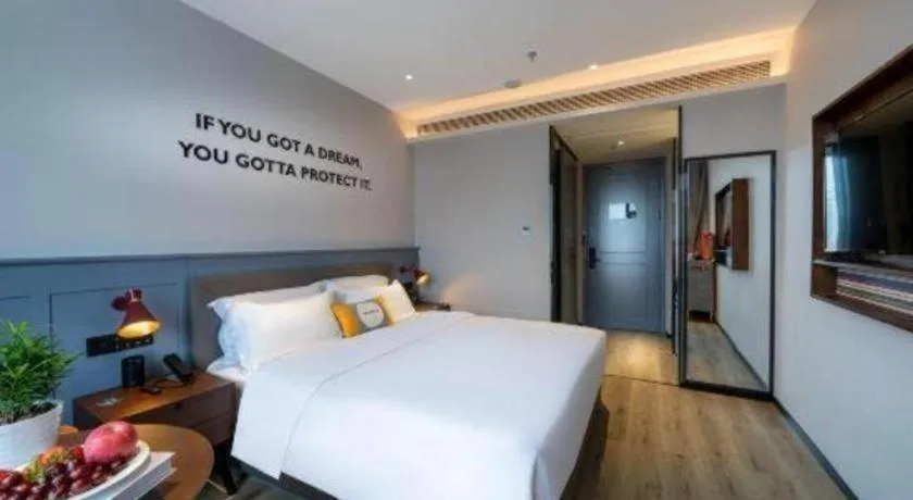 Bed in Premier City Comfort Hotel Suizhou Wuyue Plaza