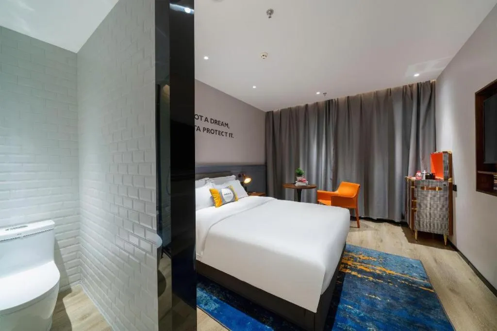 Bed in Premier City Comfort Hotel Suizhou Wuyue Plaza