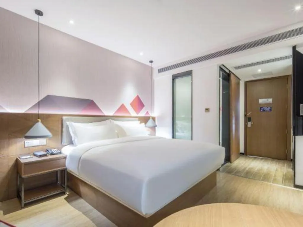 Bed in Borrman Hotel Wuzhou Teng County