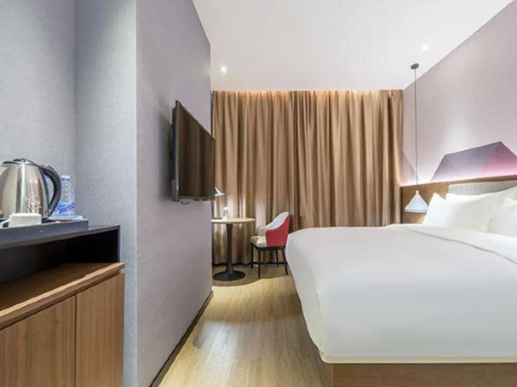 Bed in Borrman Hotel Wuzhou Teng County