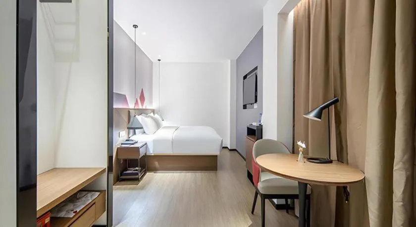 Bed in Borrman Hotel Wuzhou Teng County