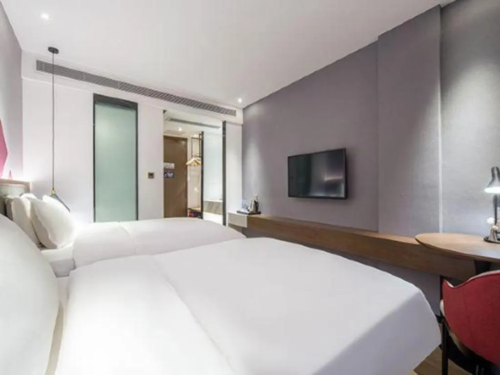 Bed in Borrman Hotel Wuzhou Teng County