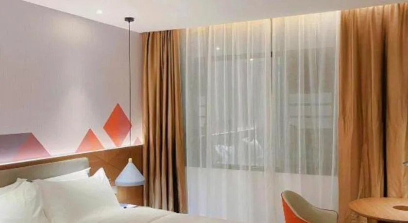 Bed in Borrman Hotel Wuzhou Teng County