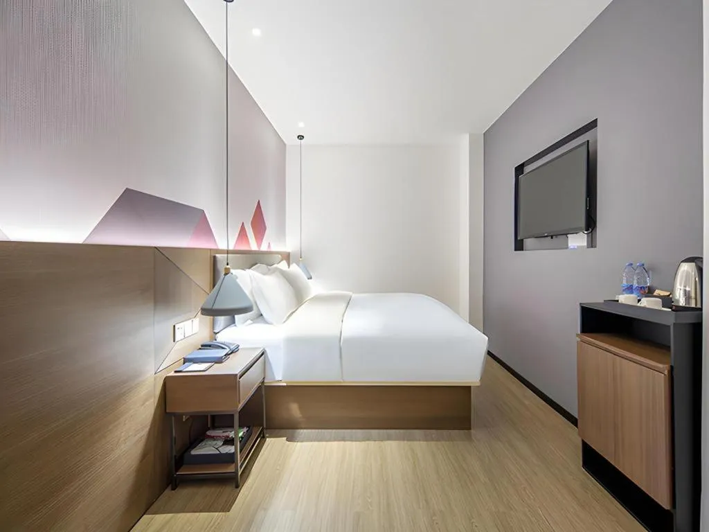 Bed in Borrman Hotel Wuzhou Teng County