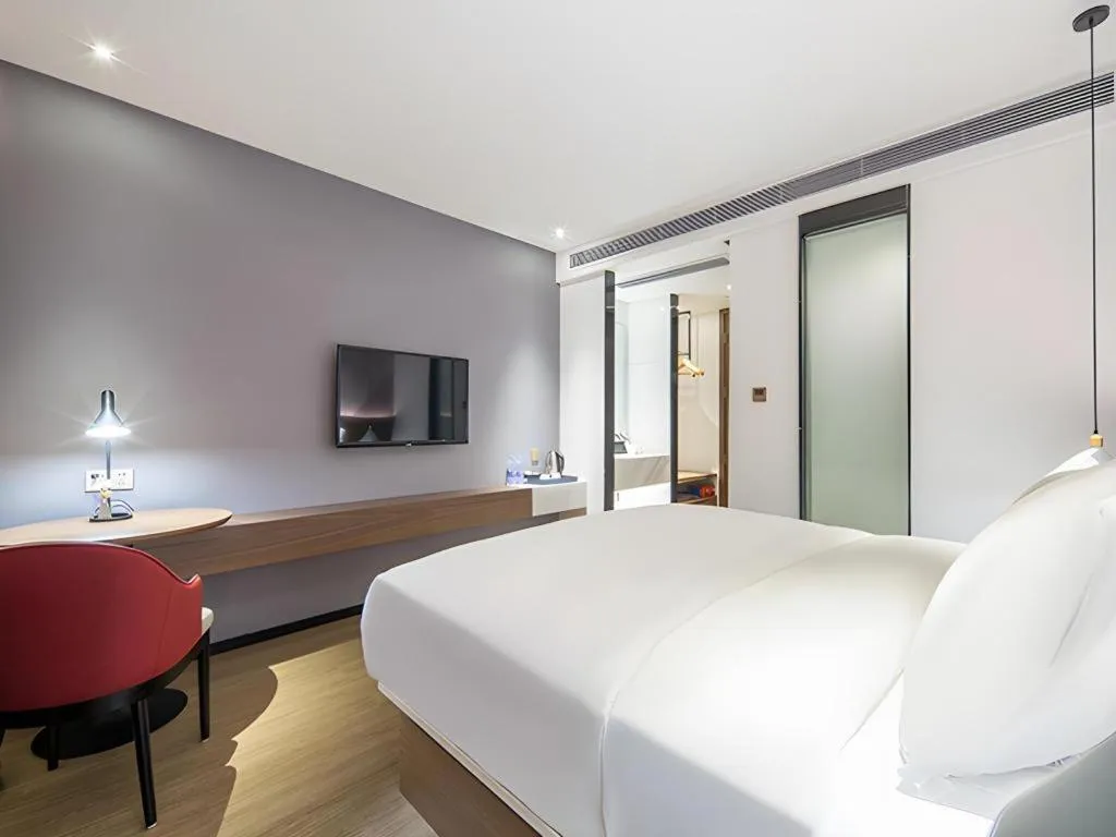 Bed in Borrman Hotel Wuzhou Teng County