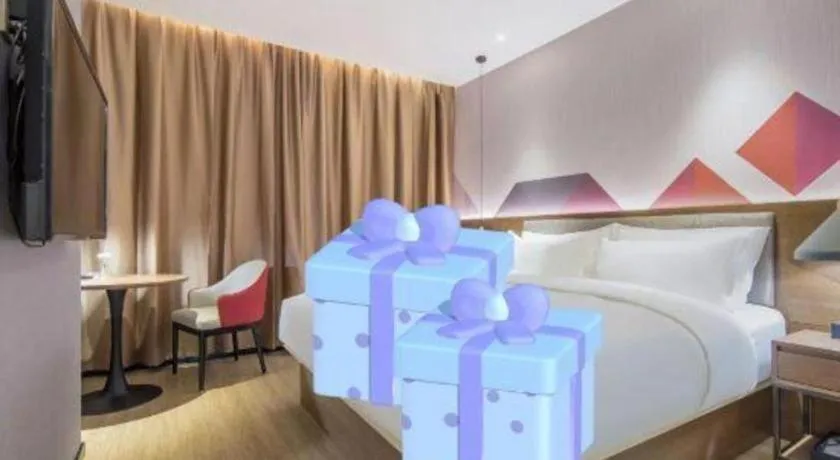 Bed in Borrman Hotel Wuzhou Teng County